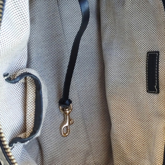 Dooney & Bourke Classic Cream Signature Canvas and Black Leather Baguette Bag - Picture 14 of 17